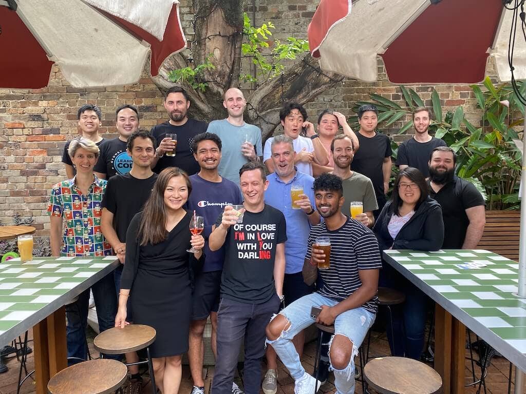 group photo of all the people in my bootcamp drinking beers